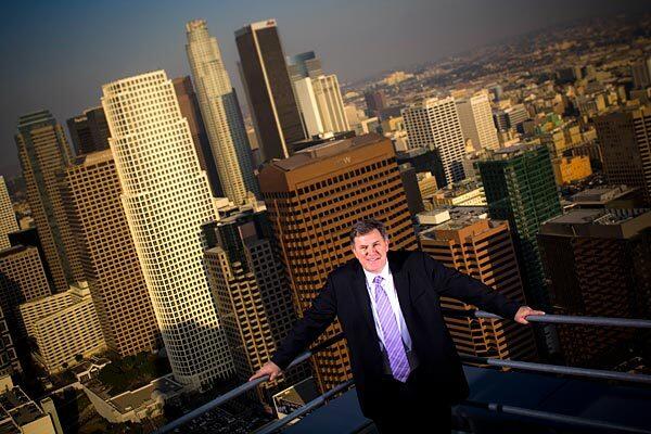 Tim Leiweke of Anschutz Entertainment Group stands atop the new 52-story Ritz-Carlton tower at L.A. Live.