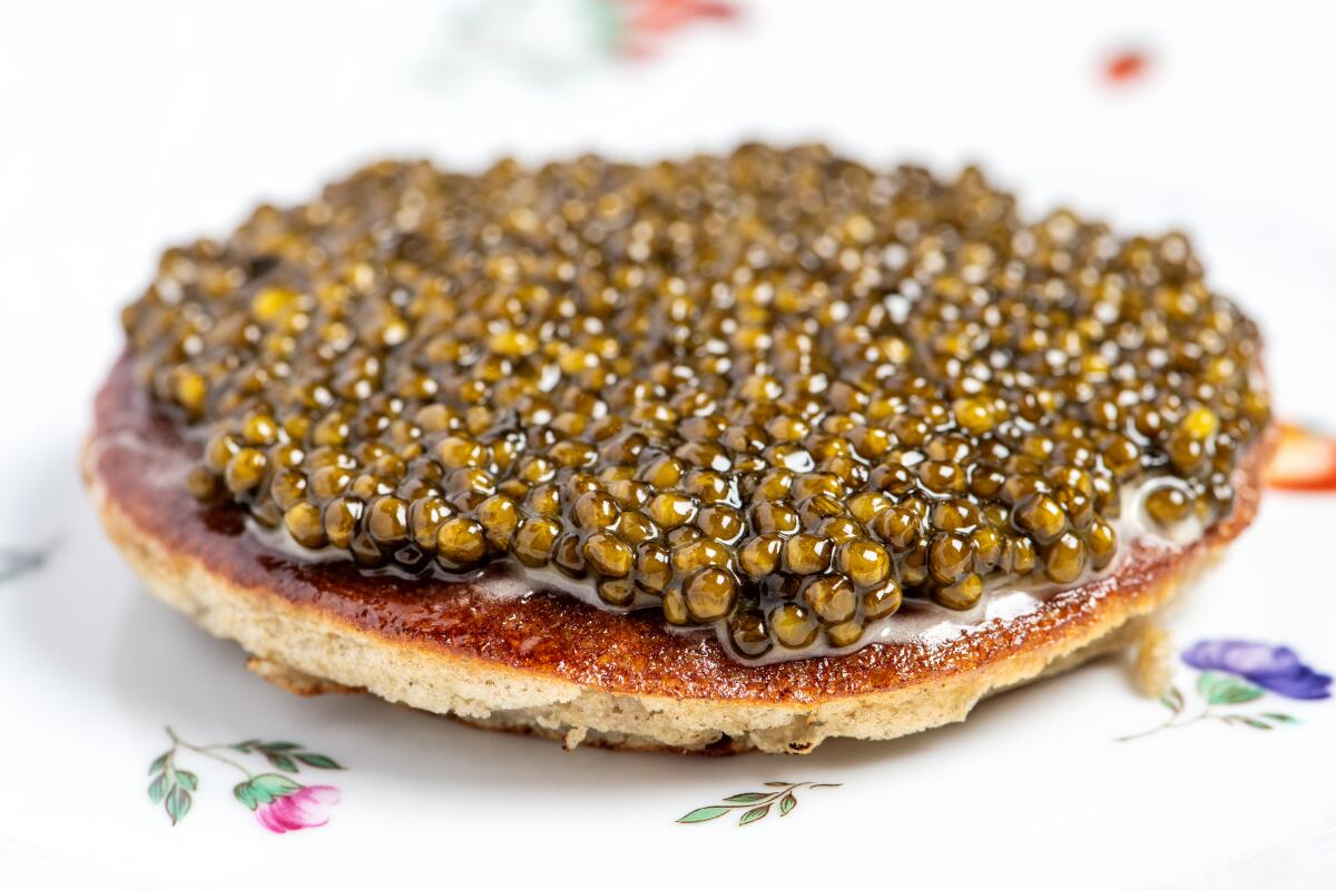 Caviar with banana pancake