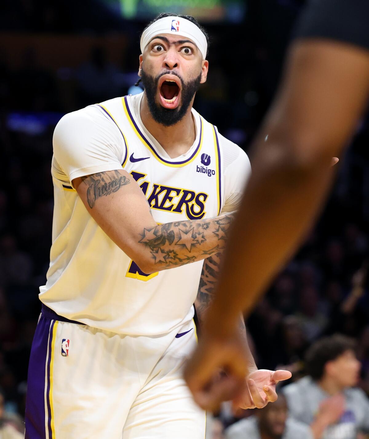 Anthony Davis shouts during a game.