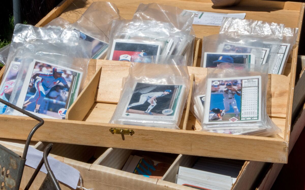 Before selling your baseball cards, do some research and see what they're worth.