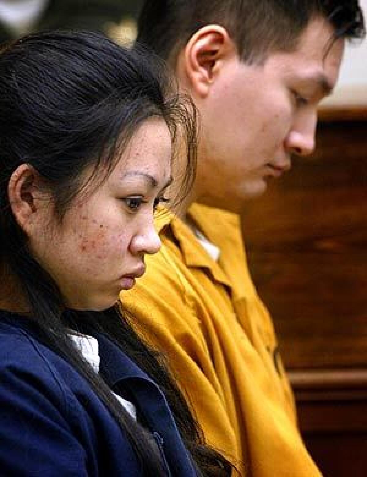 April 2004 photo of Sheila Marie Sikat and David Shoutyh Hwang at their preliminary hearing in Harbor Court.