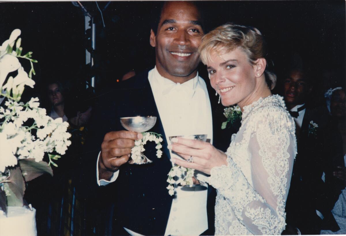 An image from "O.J.: Made In America" of O.J. Simpson, with bride Nicole Brown Simpson.