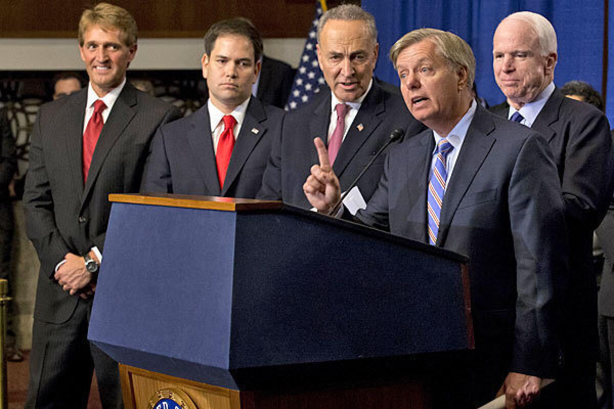 Sen. Lindsey Graham (R-S.C.), second from right, speaks about immigration reform during a news conference in Washington. A bipartisan group of House lawmakers has reached agreement on an immigration bill that would parallel work underway in the Senate with Graham and his colleagues.