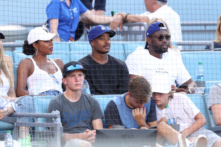 LOS ANGELES, CALIFORNIA - AUGUST 25: Gabrielle Union, Adair Curtis and Dwyane Wade attend The Los Angeles Dodgers Game at Dodger Stadium on August 25, 2019 in Los Angeles, California. (Photo by Jerritt Clark/Getty Images)