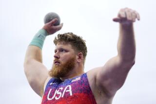 Ryan Crouser, of the United States, competes in the men's shot put final at the 2024 Summer Olympics, Saturday, Aug. 3, 2024, in Saint-Denis, France. (AP Photo/Bernat Armangue)