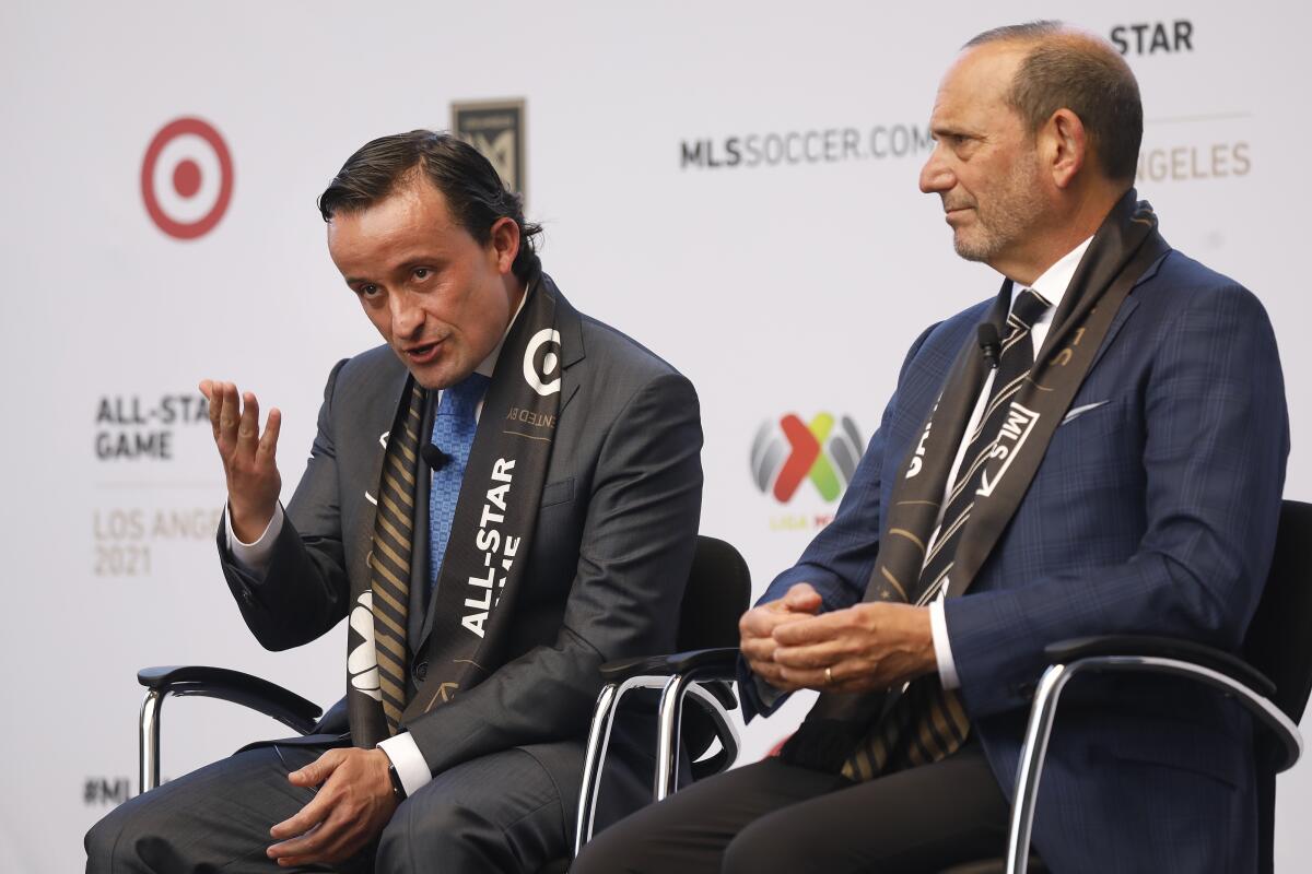 Don Garber, right, Commissioner of Major League Soccer MLS with Mikel Arriola, left, LIGA MX president.
