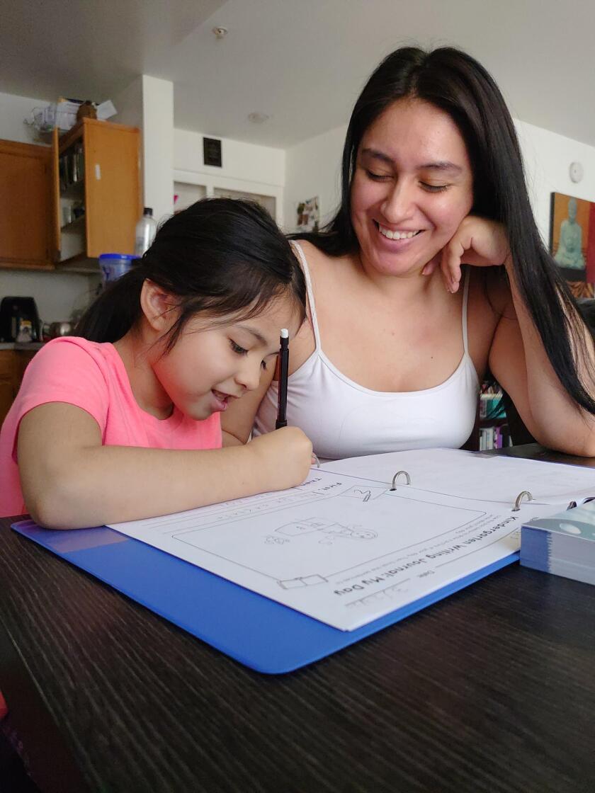 UCLA student Zuleika Bravo with daughter Iris Jimenez
