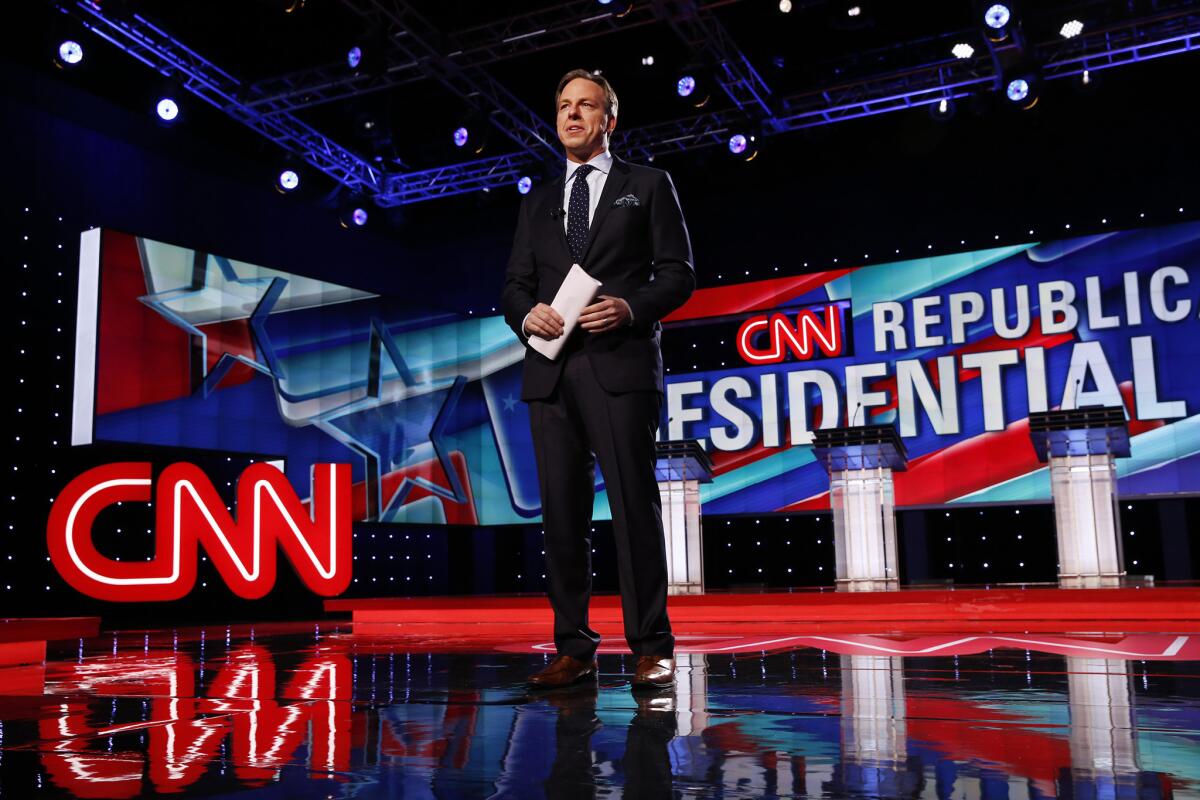 Jake Tapper moderates the Republican primary debate hosted by CNN, the University of Florida and the Washington Times.