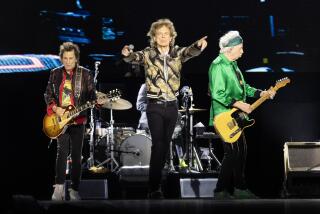 INGLEWOOD, CA - JULY 10, 2024: The Rolling Stones perform on July 10, 2024 at SoFi Stadium in Inglewood, California. From the left: guitarist Ron Wood, Mick Jagger and guitarist Keith Richards.(Gina Ferazzi / Los Angeles Times)