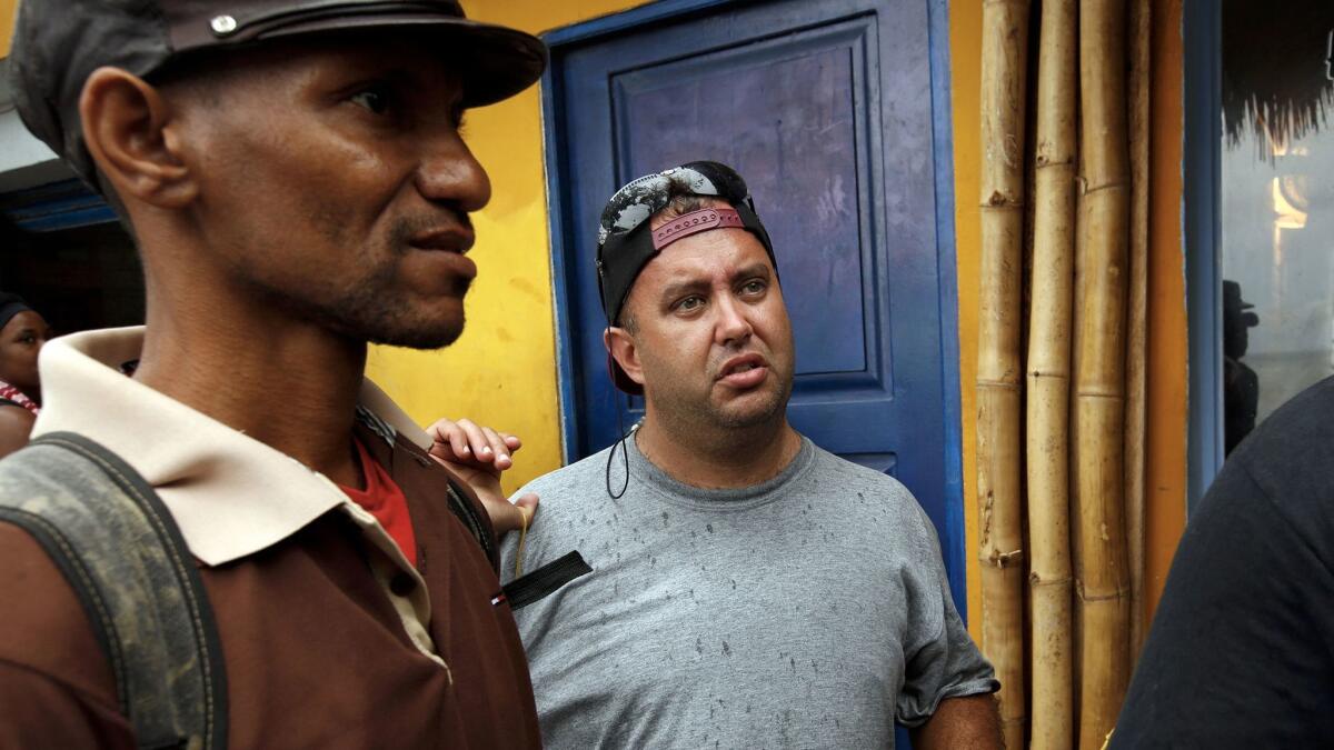 Gutierrez, center, and Marcelino Quintana fled Cuba in August. Since November, Gutierrez has been living in Costa Rica.