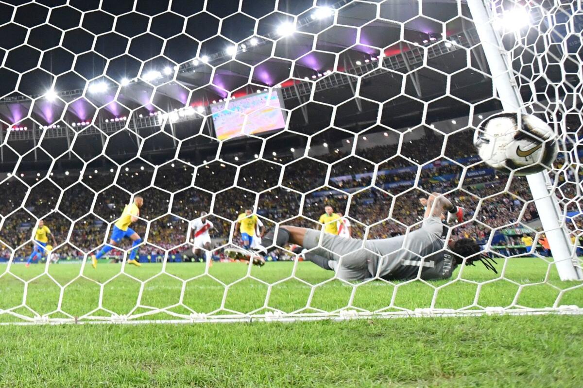 Brazil's Richarlison celebrates after scoring against Peru during the Copa America football tournament final match at Maracana Stadium in Rio de Janeiro, Brazil, on July 7, 2019.
