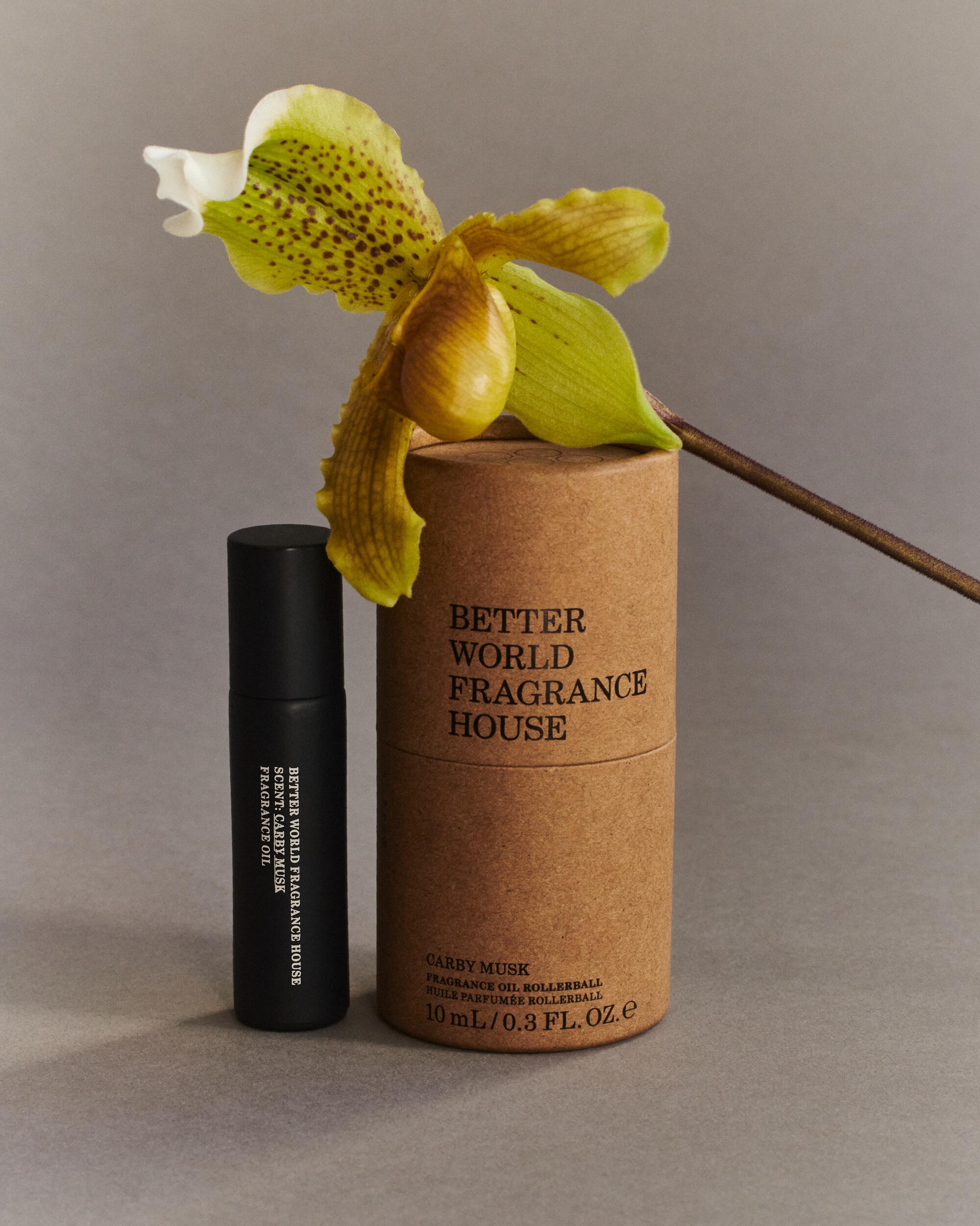 A bottle and case for Better World Fragrance House's Carby Musk.