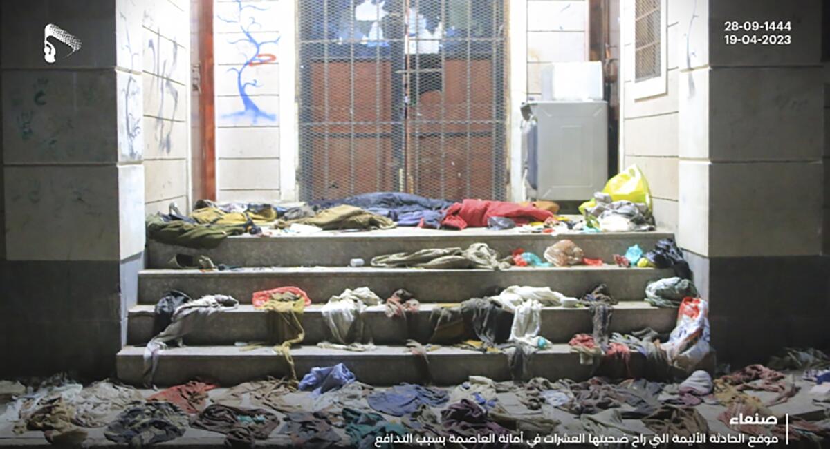 Clothing and other belongings strewn on the ground after a crowd stampede