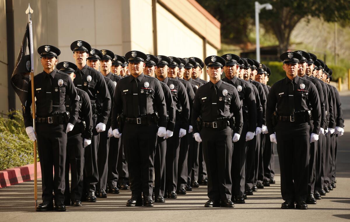 Los Angeles Police Department recruits at a graduation ceremony in April