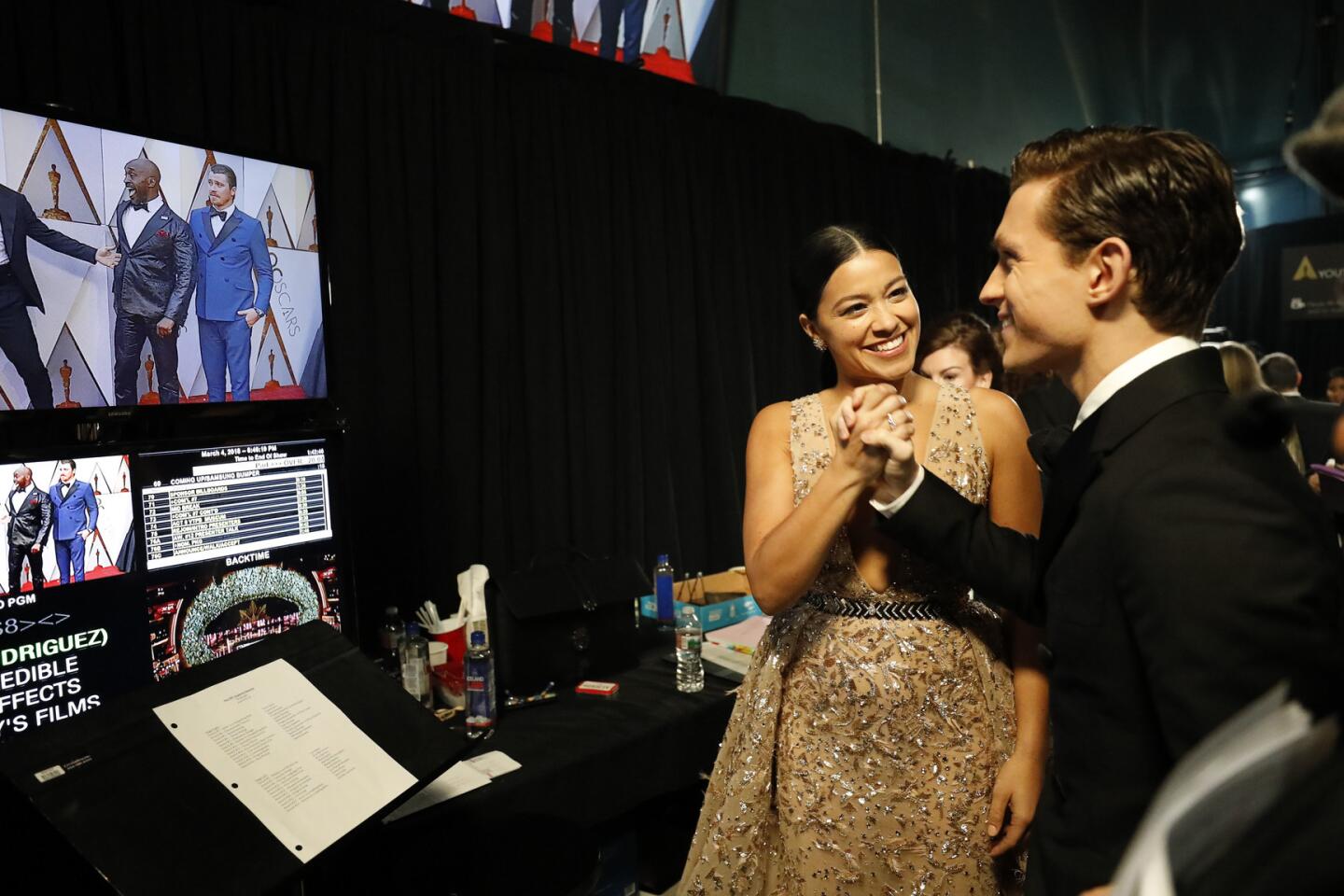 Gina Rodriguez and Tom Holland backstage at the 90th Academy Awards on Sunday at the Dolby Theatre in Hollywood.