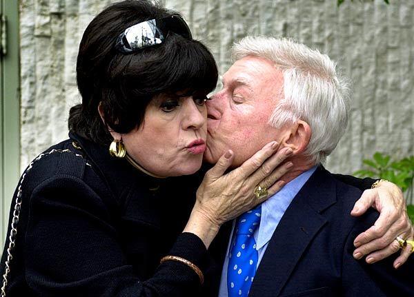 Gibson gives fellow former "Rowan & Martin's Laugh-In" cast member Jo Anne Worley a kiss during a ceremony honoring comedian Dick Martin and his late comic partner Dan Rowan with a star on the Hollywood Walk of Fame.