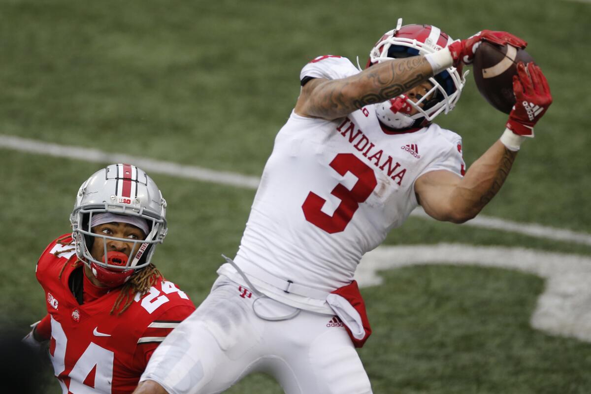 Indiana receiver Ty Fryfogle catches a pass for a touchdown over Ohio State defensive back Shaun Wade