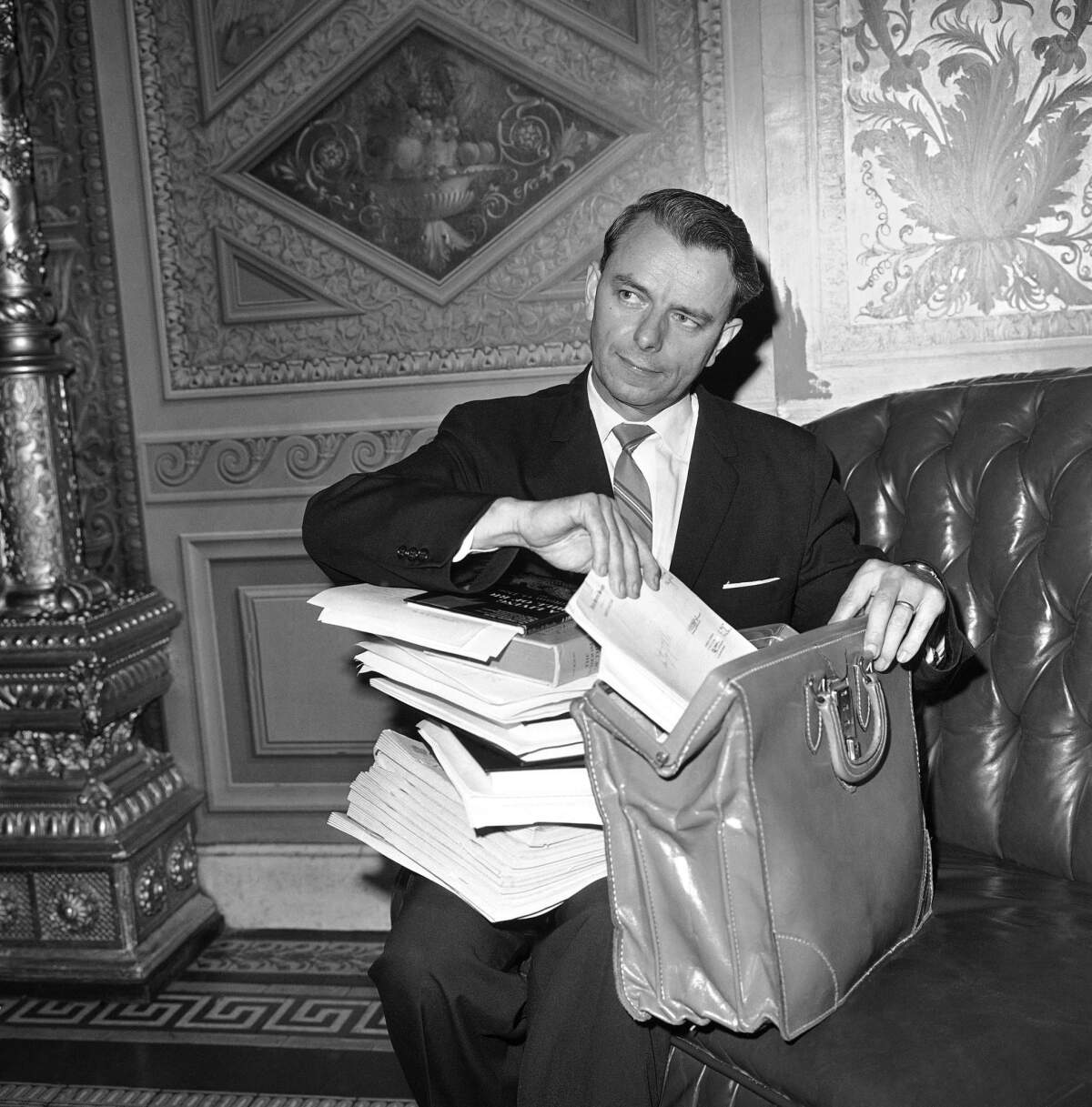 In this 1964 photo, Sen. Robert C. Byrd (D-W.Va.) repacks his briefcase after a more than 15-hour filibuster against a civil rights bill.