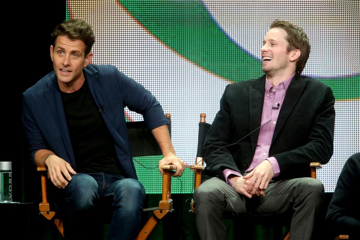 Stars Joey McIntyre, left, and Tyler Ritter talk about "The McCarthys" during the CBS panel at the Television Critics Assn. Press Tour at the Beverly Hilton Hotel.