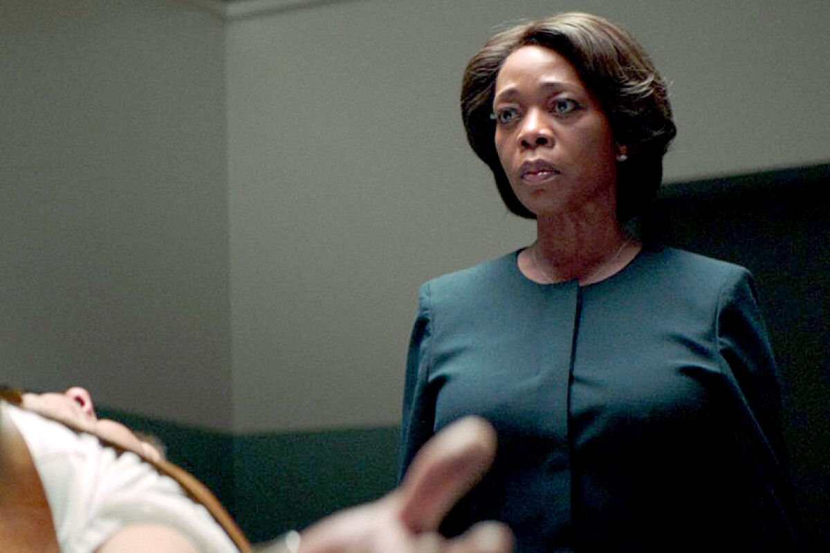 Alex Castillo and Alfre Woodard in the movie "Clemency."