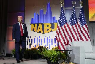 Republican presidential candidate former President Donald Trump walks on stage at the National Association of Black Journalists, NABJ, convention, Wednesday, July 31, 2024, in Chicago. (AP Photo/Charles Rex Arbogast)