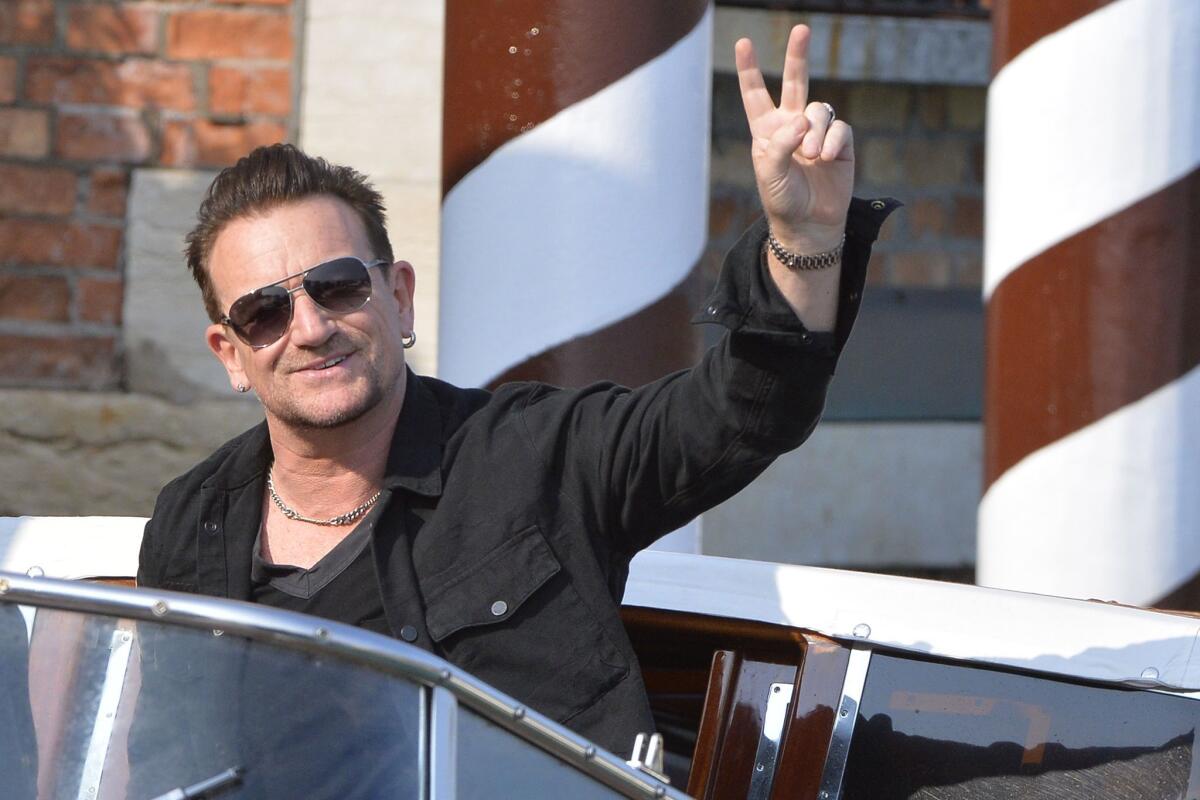 Bono arrives at the Cipriani Hotel in Venice, Italy, for the wedding of George Clooney and Amal Alamuddin on Sept. 27.