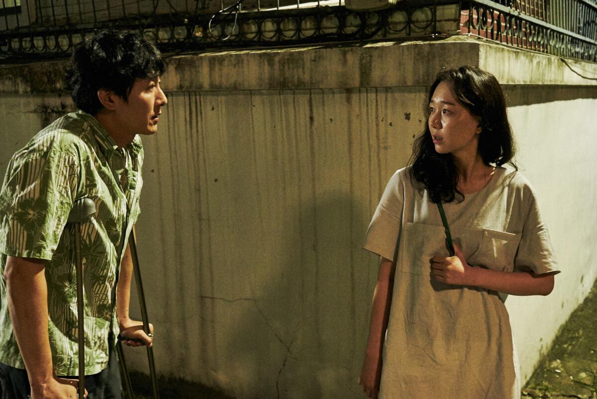 Kim Joo-hyuk, left, and Lee Yoo-young in Hong Sang-soo's "Yourself and Yours."