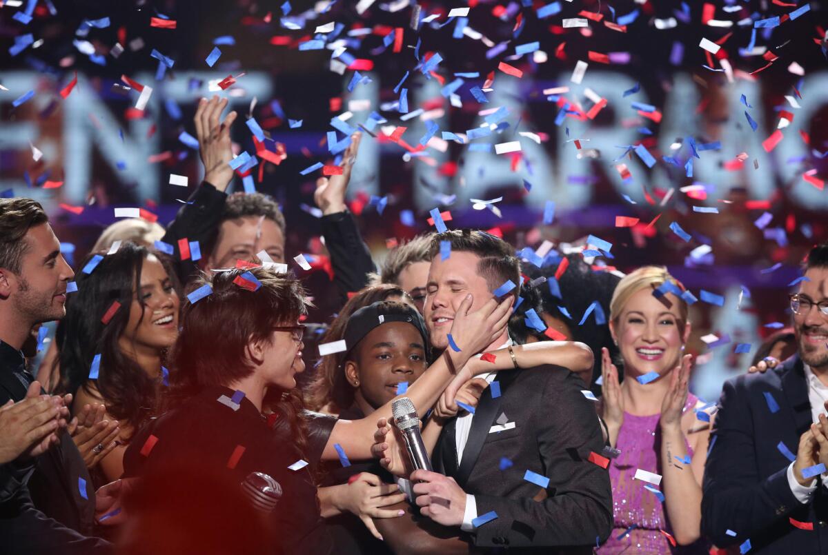 Trent Harmon, a winner of "American Idol," celebrates with fellow contestants.