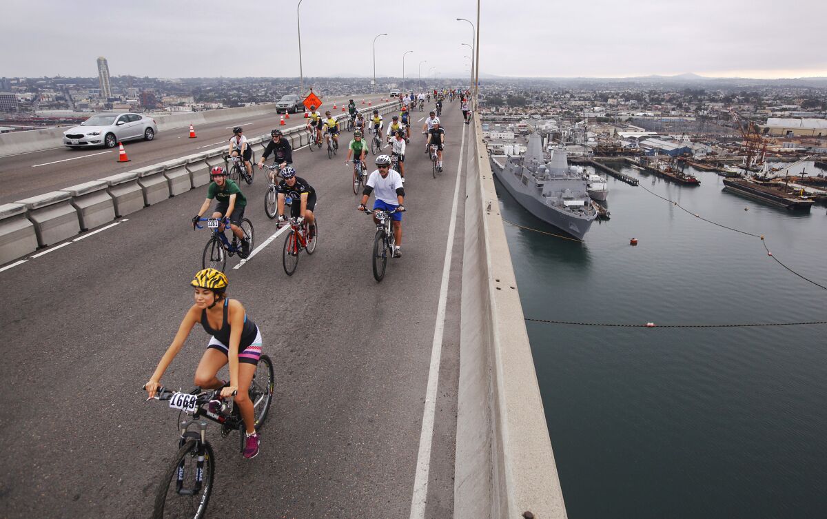 Riders make their way over the San Diego-Coronado Bay Bridge during the ninth annual Bike the Bay ride. (Photo by K.C. Alfred/The San Diego Union-Tribune)