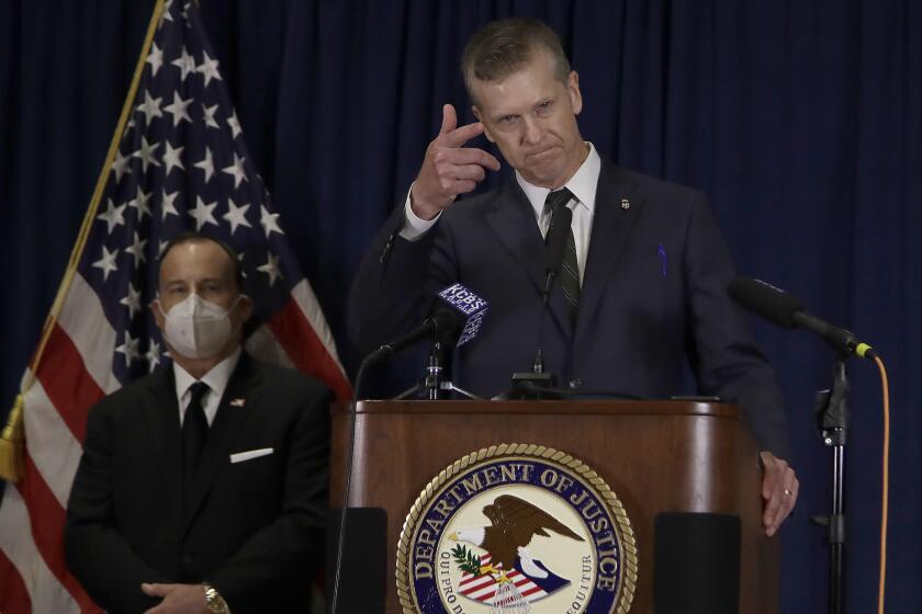 David L. Anderson, U.S. Attorney for the Northern District of California, speaks during a news conference on Tuesday, June 16, 2020, in Oakland, Calif. An Air Force sergeant already jailed in the ambush killing of a California sheriff's deputy was charged Tuesday in the shooting death of a federal security officer outside the U.S. courthouse in Oakland during a night violent protest last month. Staff Sgt. Steven Carrillo was charged with murder and attempted murder in the killing of federal officer Dave Patrick Underwood, 53. (AP Photo/Ben Margot)