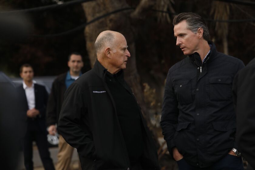 Genaro Molina  Los Angeles Times THEN-GOV. Jerry Brown and successor Gavin Newsom visit Malibu last year after the Woolsey fire. Scientists say climate change is fueling larger wildfires.
