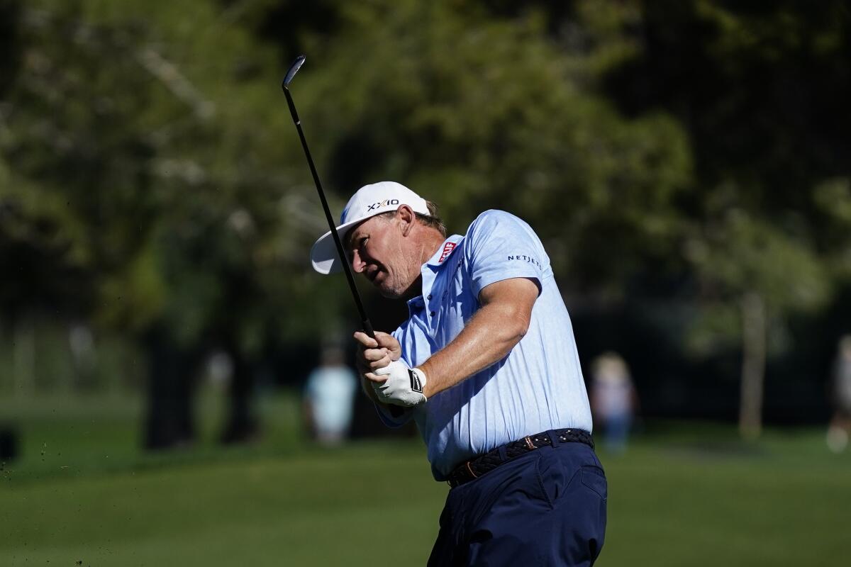 Ernie Els hits an approach shot during the Charles Schwab Cup Championship in November.