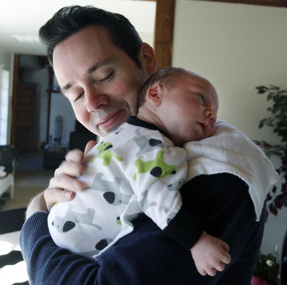 Photo Gallery: Burbank man loses wife after giving birth to second son