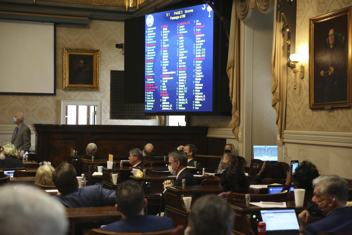 South Carolina Rep. David Hiott says a prayer as the House votes on abortion bill