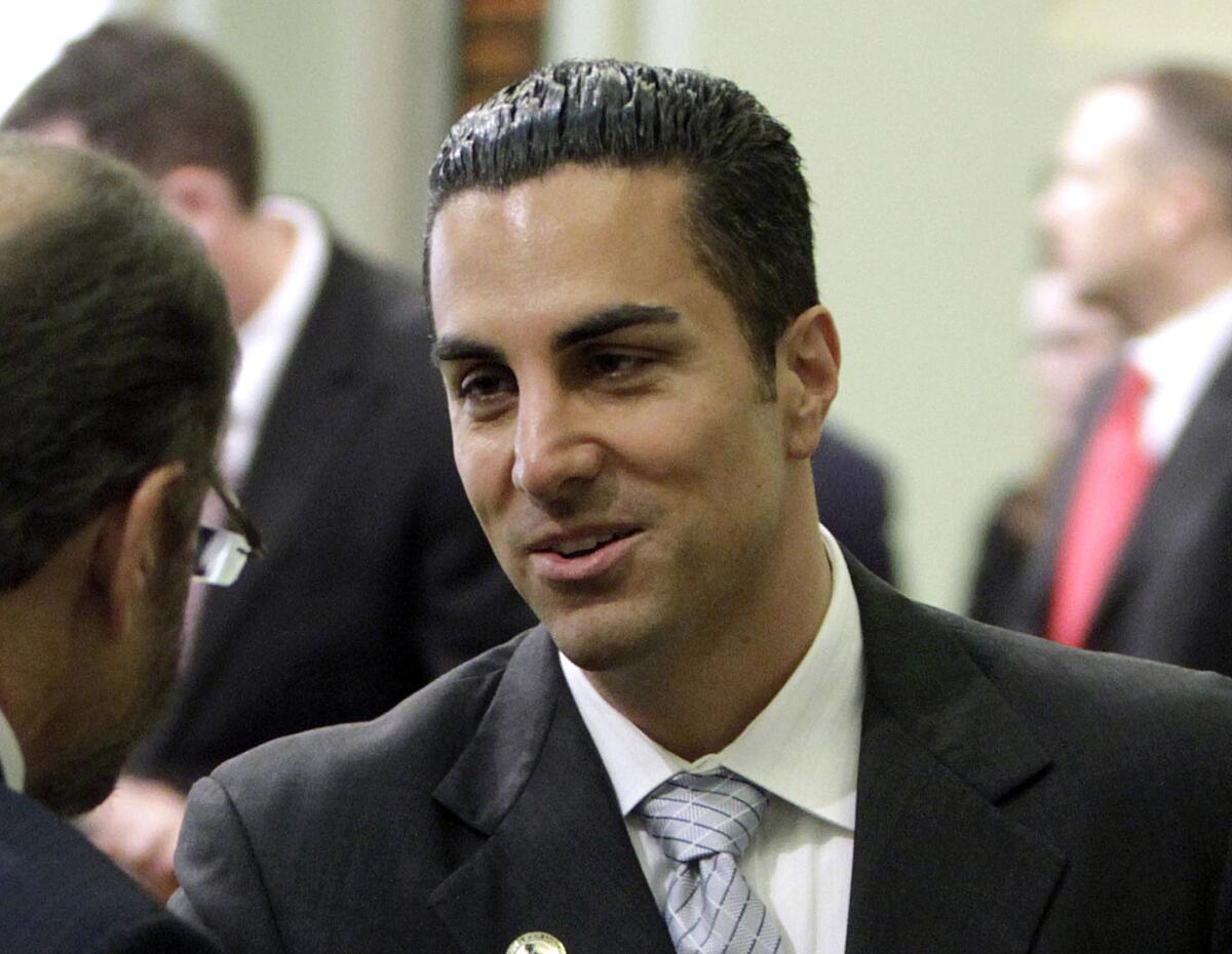 Assemblyman Mike Gatto talks after his swearing-in at the Capitol in Sacramento.