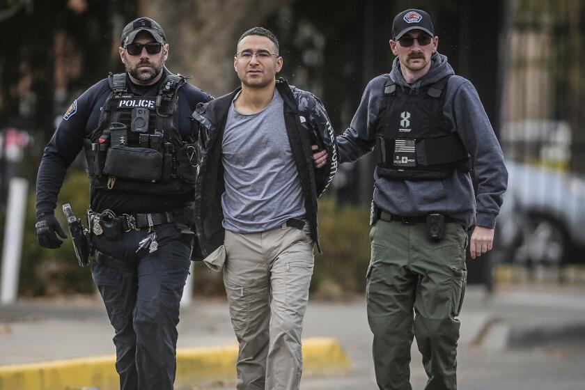 Solomon Peña is taken into custody by Albuquerque, New Mexico