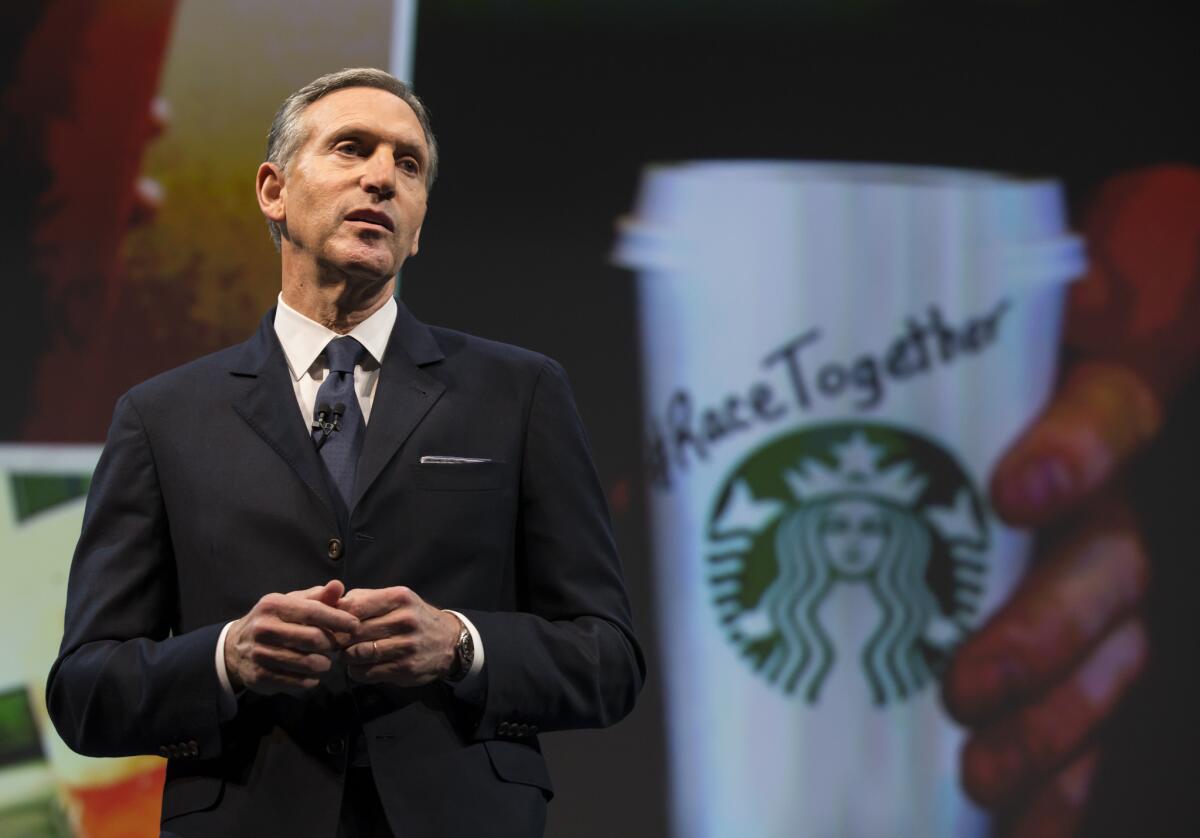 Starbucks Chairman and CEO Howard Schultz addresses the "Race Together Program" during the Starbucks annual shareholders meeting on March 18, 2015 in Seattle, Washington.