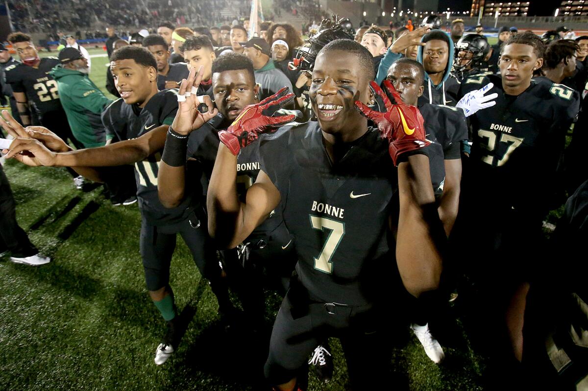 Narbonne football players celebrate their City Section championship in 2016, the third of what would be five in a row.