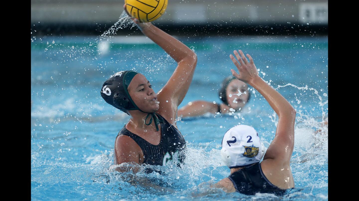 Costa Mesa High's Taiuta Uiagalelei (6) competes against Marina during the first half in a nonleague match at Costa Mesa High on Wednesday, December 12, 2018.