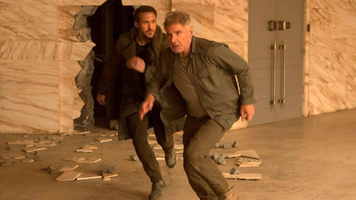 Ryan Gosling, left, and Harrison Ford in "Blade Runner 2049."