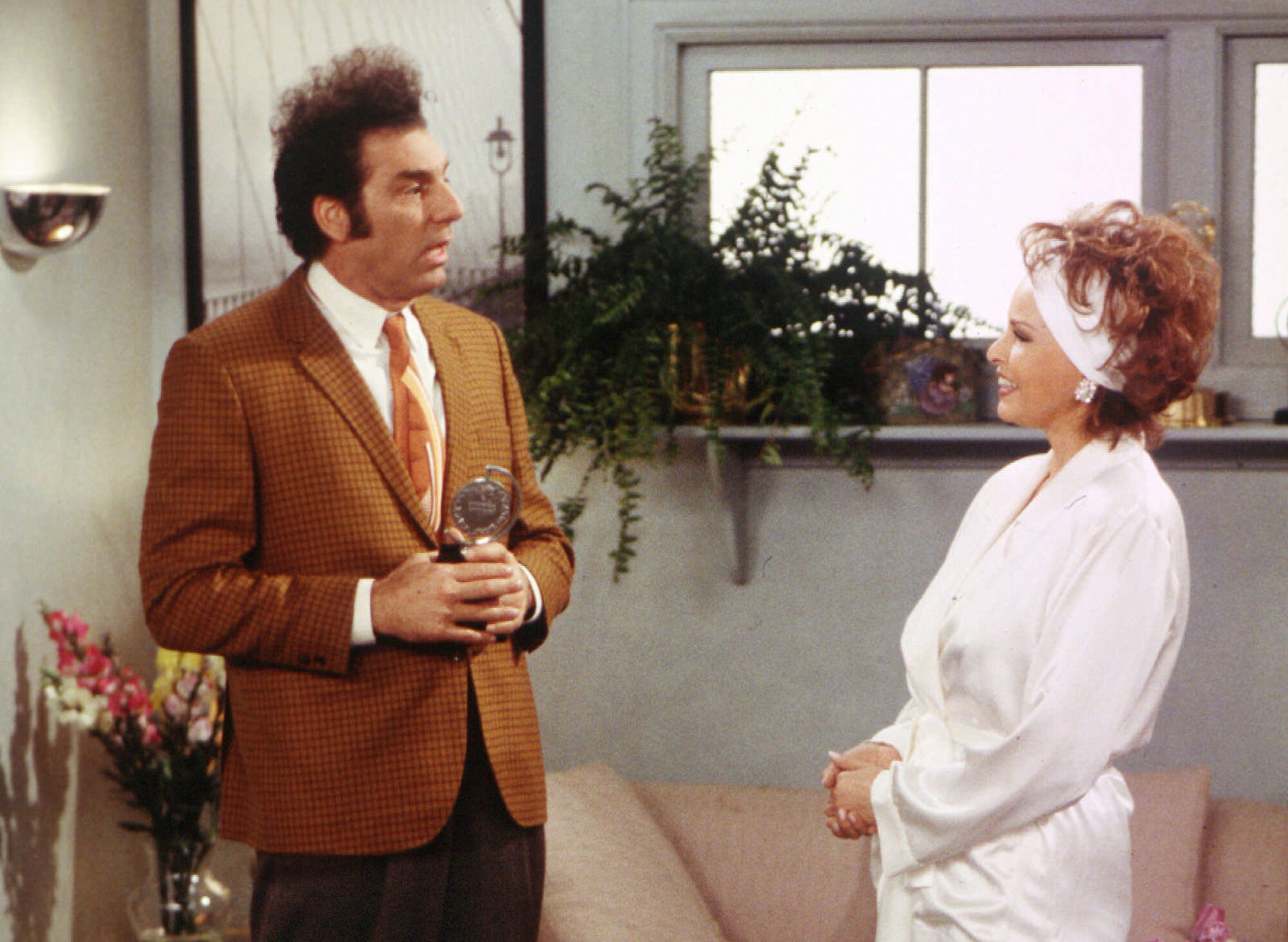 Raquel Welch, right, on set with Michael Richards