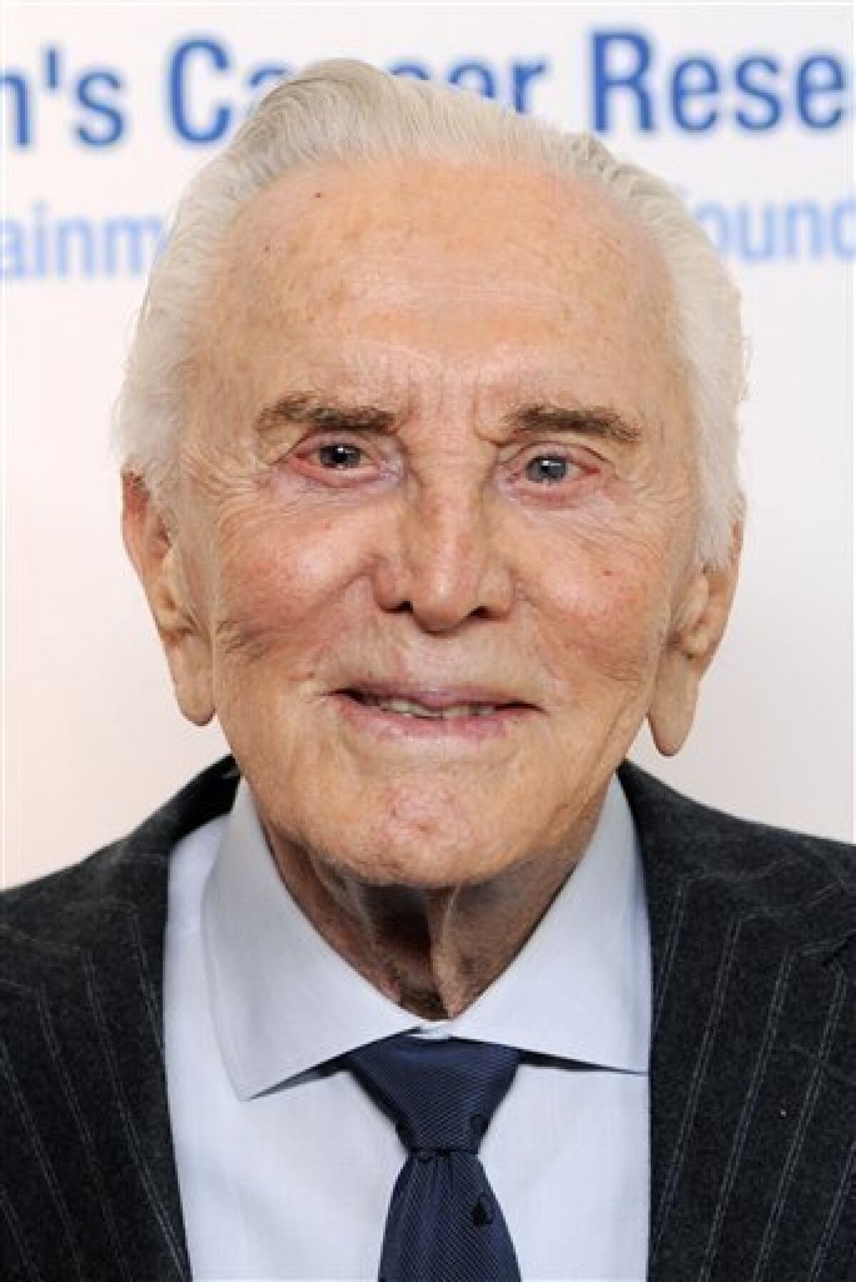 FILE - In this Feb. 10, 2011 file photo, actor Kirk Douglas arrives at the annual "An Unforgettable Evening" event benefiting the Entertainment Industry Foundation's Women's Cancer Research Fund, in Beverly Hills, Calif. (AP Photo/Chris Pizzello, file)