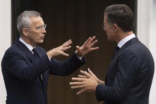 NATO Secretary General Jens Stoltenberg, left, and Dutch Prime Minister Mark Rutte, right, talk while waiting for other leaders to arrive in The Hague, Netherlands, Tuesday, June 27, 2023. Leaders of seven NATO allies met in the Netherlands with Secretary-General Stoltenberg for talks ahead of the alliance's summit in Lithuania next month. (AP Photo/Peter Dejong)