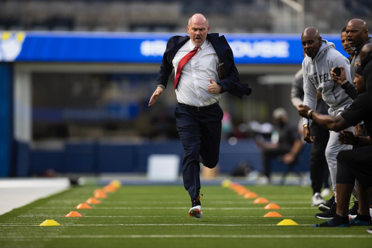 Rich Eisen runs the 40-yard dash on April 17 at SoFi Stadium in Inglewood.