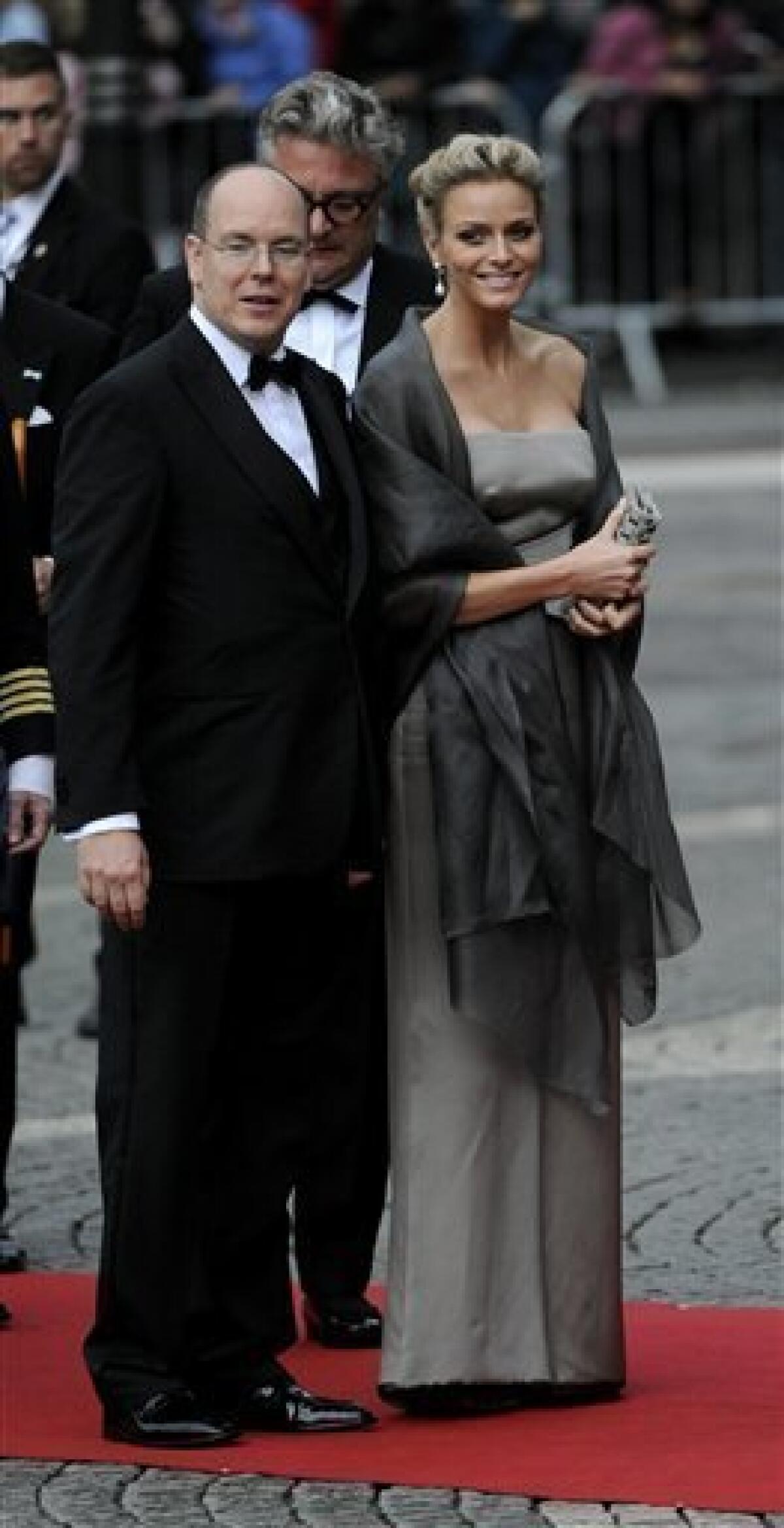 Prince Albert of Monaco and Charlene Wittstock, arrive at the Swedish Parliament's concert at the Royal Concert Hall in Stockholm, Sweden, Friday June 18, 2010. Crown Princess Victoria will marry Daniel Westling on Saturday, June 19. (AP Photo/Scanpix, Maja Suslin)
