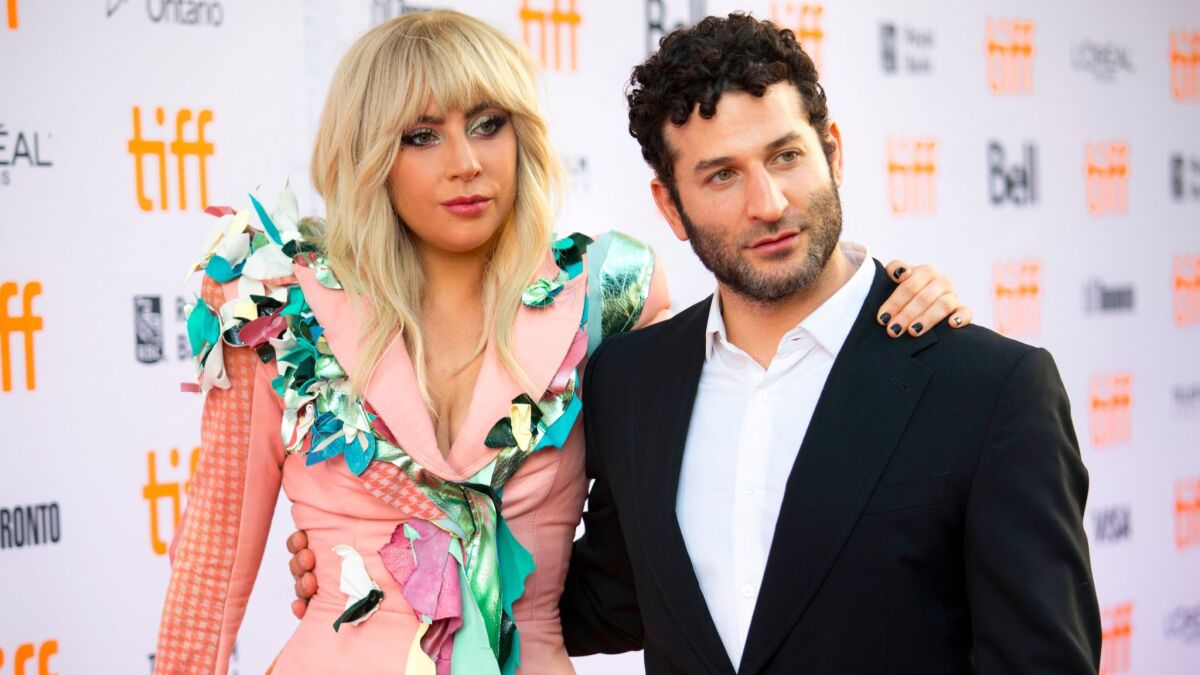 Lady Gaga and director Chris Moukarbel arrive for the premiere of the documentary at the Toronto International Film Festival.