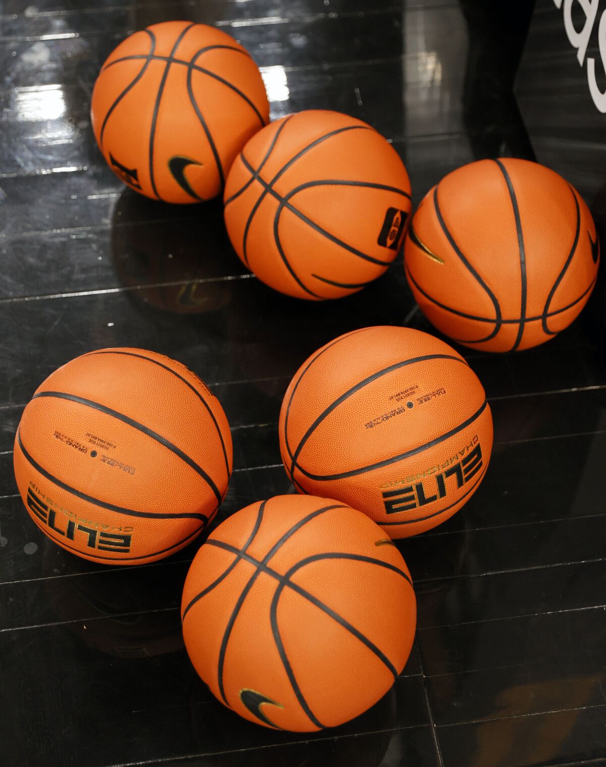Basketballs on a court.