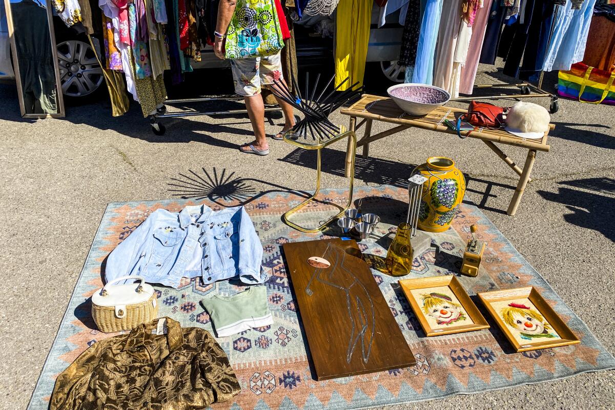 Items for sale on a rug 
