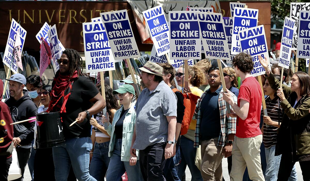 UC Santa Cruz academic workers carry strike pickets. 