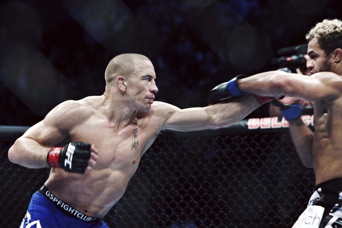 Georges St-Pierre is among the fighters who are scheduled to attend a UFC event at L.A. Live on Tuesday.